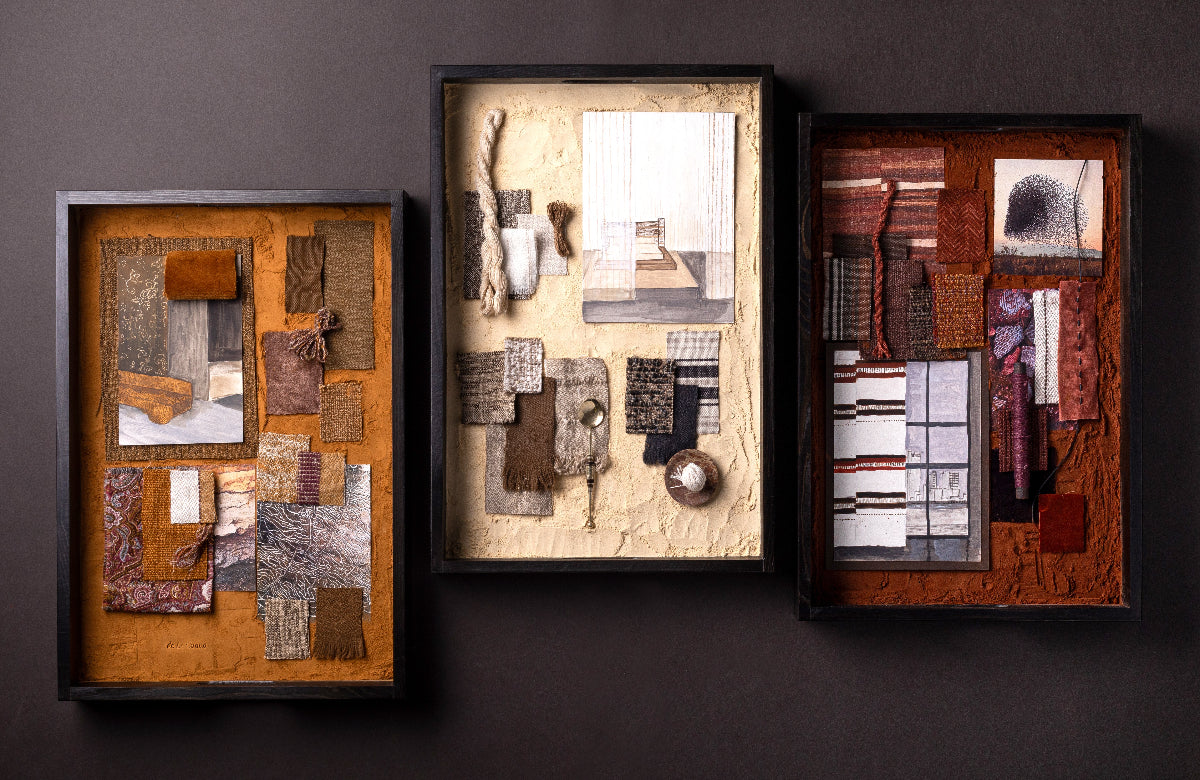 Three framed textured wall art pieces on a dark background